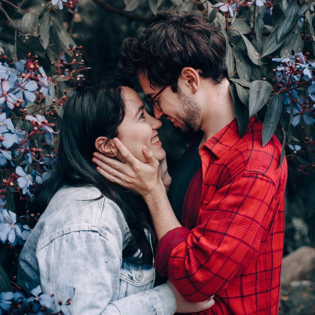 Portrait of young happy couple in love, smiling and embracing in garden,  Stock Photo, Picture And Low Budget Royalty Free Image. Pic. ESY-054292543  | agefotostock