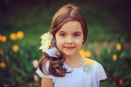 before and after retouch portrait of a little girl with a tail