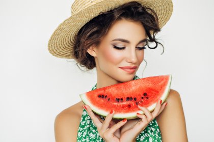 before and after retouch girl in a hat and a green dress with a watermelon