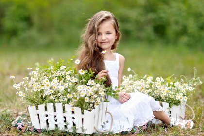before and after retouch little girl in the flowerbed
