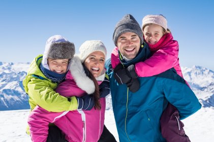 retouched photos before and after happy family on the ski slope
