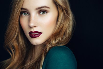 before and after retouching portrait of a woman with dark lips