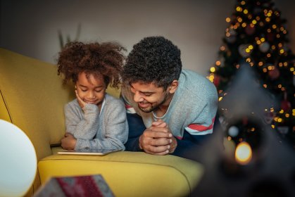 editing family portraits in photoshop dad and daughter reading